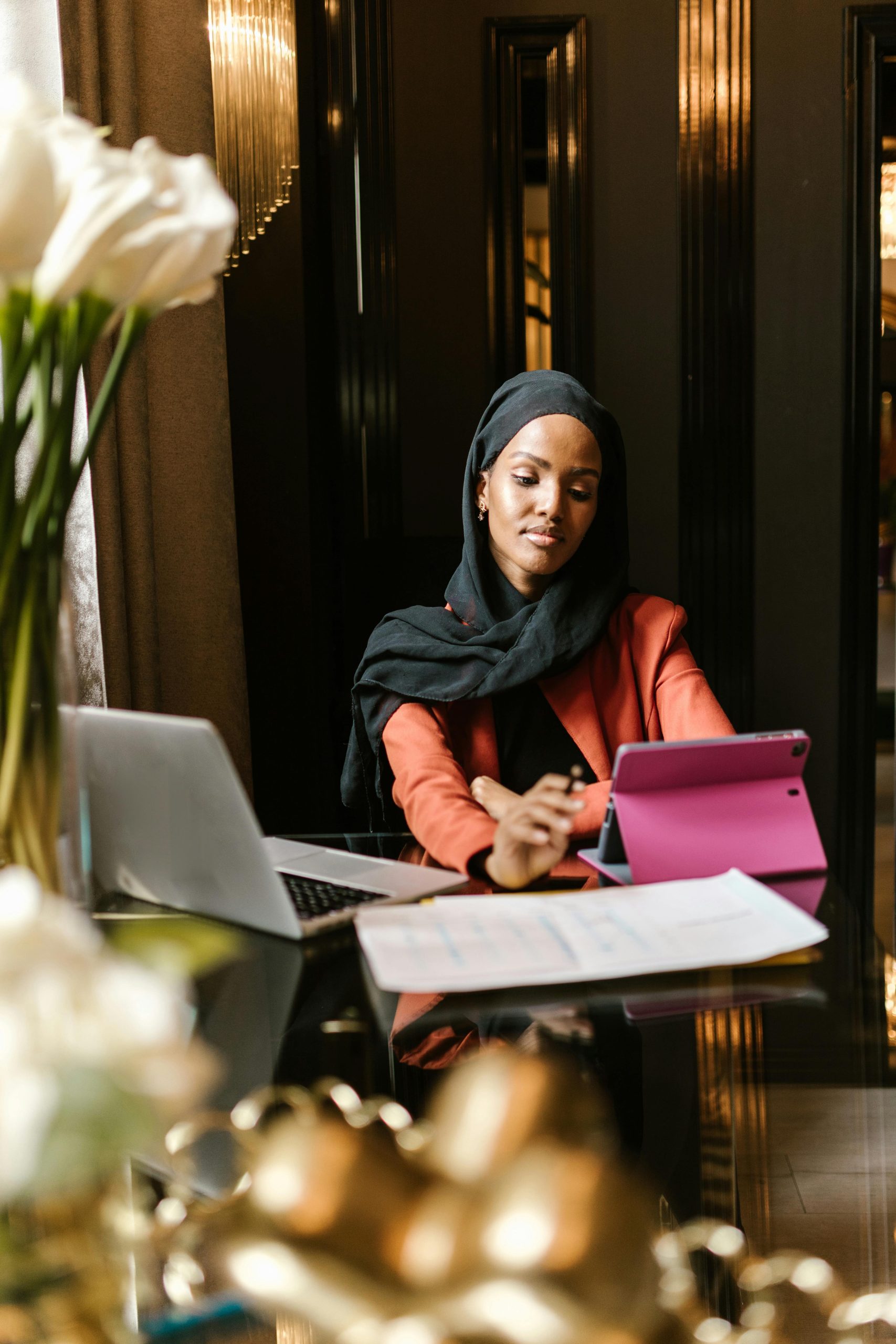 Hijab wearing woman working Hijab wearing woman working